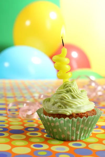 Delicious birthday cupcake on table on bright background — Stock Photo, Image