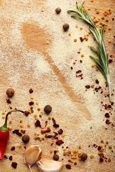 Spices on table with spoon silhouette, close-up — Stock Photo, Image