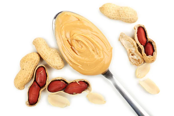 Creamy peanut butter in spoon, close-up — Stock Photo, Image