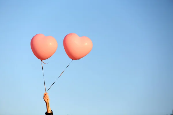 Love heart balloons on sky background — Stock Photo, Image