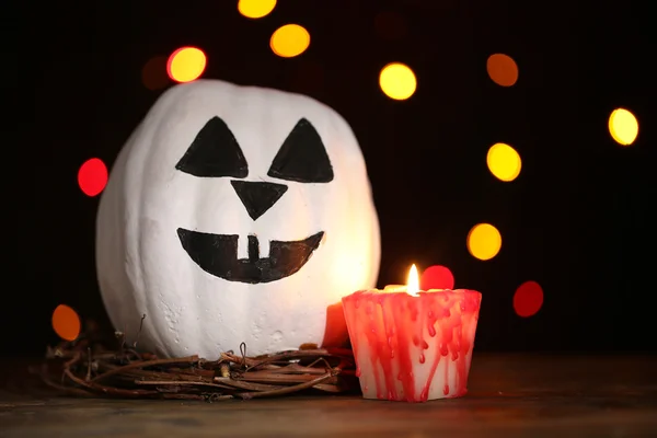 Halloween white pumpkin and candle — Stock Photo, Image