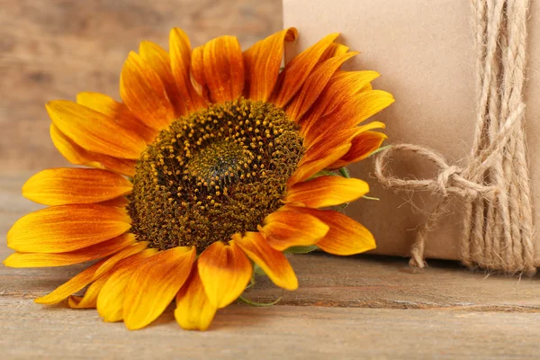 Sunflowers with present box — Stock Photo, Image