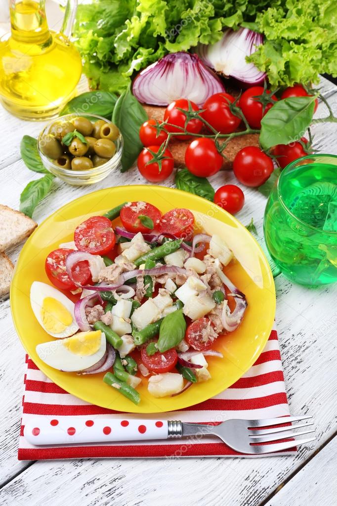 Fresh breakfast consisting of vegetable salad served on the table