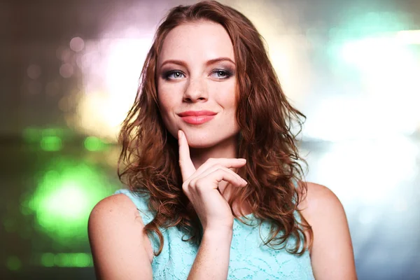 Portrait of beautiful young female on bright background — Stock Photo, Image