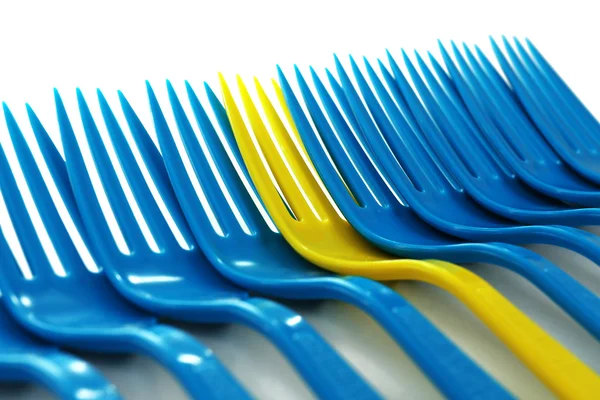 Individuality concept. Plastic disposable tableware, close-up — Stock Photo, Image
