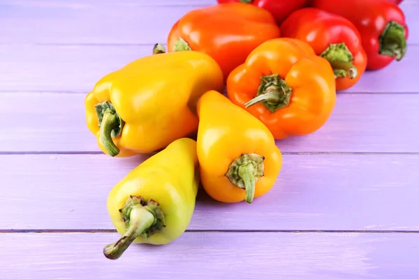 Pepper on wooden background — Stock Photo, Image