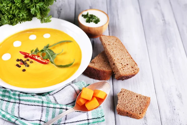 Pumpkin soup in white plate — Stock Photo, Image