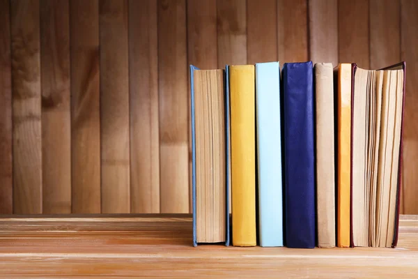 Books on wooden table — Stock Photo, Image