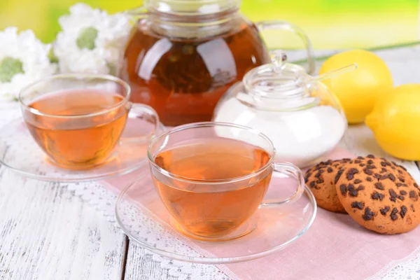 Teapot and cups of tea — Stock Photo, Image