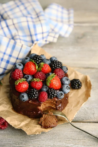 Chocolate cake with different berries — Stock Photo, Image