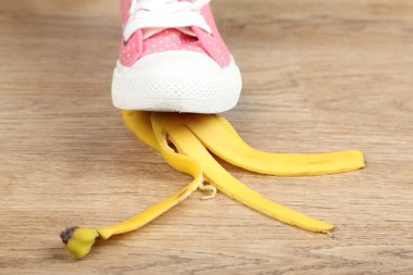 Shoe to slip on banana peel clipart