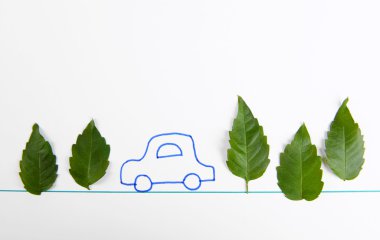 Leaves with painted car clipart