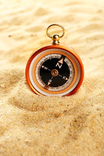 Compass on sand close-up — Stock Photo, Image