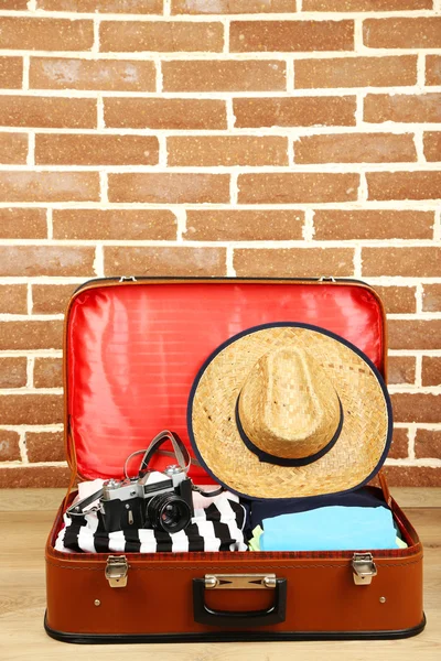 Female clothes in old suitcase — Stock Photo, Image