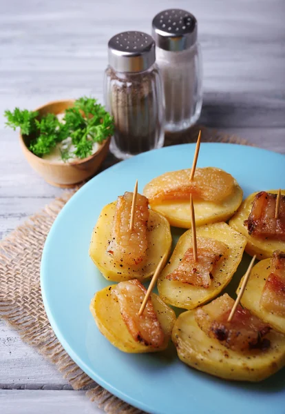 Baked potatoes with bacon — Stock Photo, Image