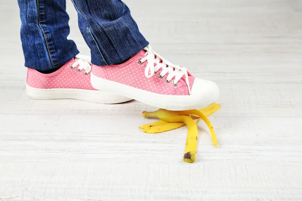 Shoe to slip on banana peel — Stock Photo, Image