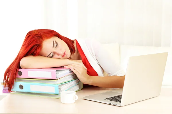 Tired girl with notebook — Stock Photo, Image