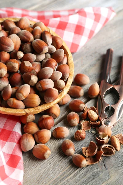 Hazelnuts in wicker basket — Stock Photo, Image