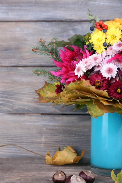 Flower bouquet in blue vase — Stock Photo, Image