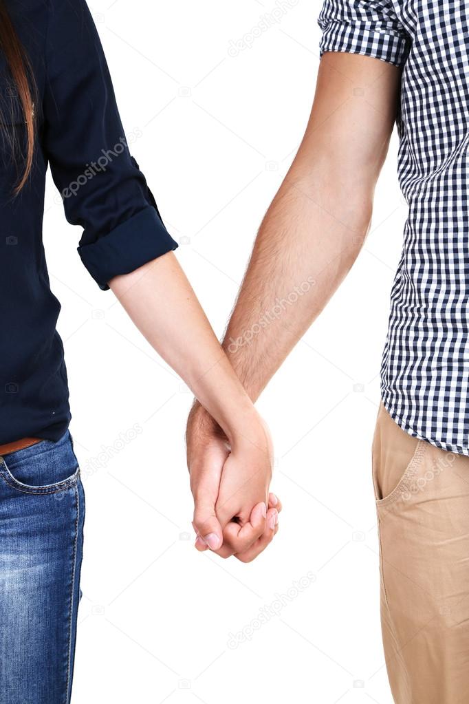 Loving couple holding hands