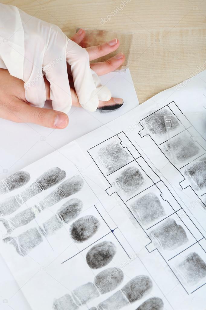 Taking fingerprints on paper