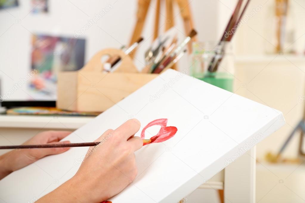 Artist painter on canvas — Stock Photo © belchonock 56867311