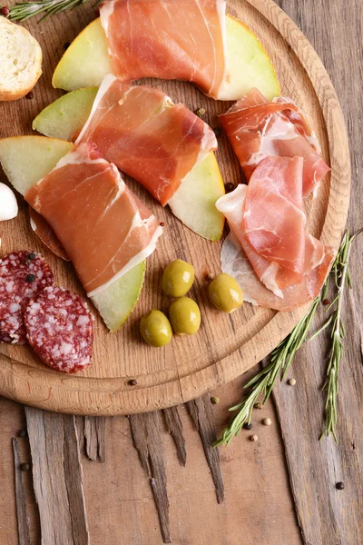 Delicious melon with prosciutto — Stock Photo, Image