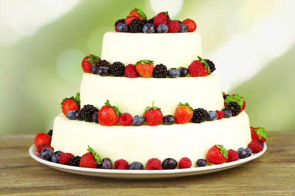 Beautiful wedding cake with berries — Stock Photo, Image