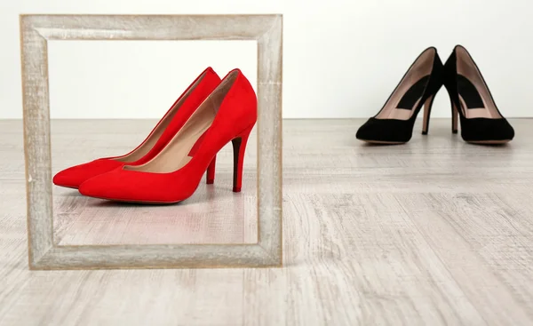 Black and red women shoes with frame — Stock Photo, Image