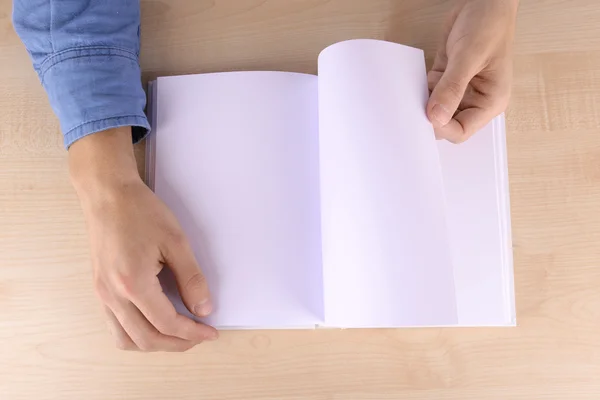 Man reading empty open book — Stock Photo, Image