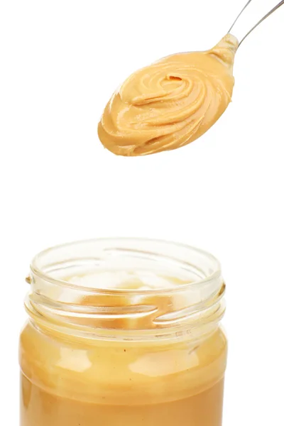 Manteiga de amendoim cremosa em frasco — Fotografia de Stock