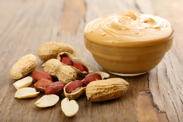 Creamy peanut butter in bowl — Stock Photo, Image