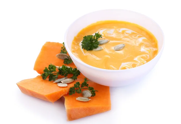 Sopa de abóbora e fatias de abóbora fresca — Fotografia de Stock