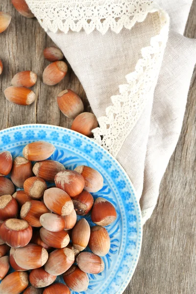 Hazelnuts on plate — Stock Photo, Image