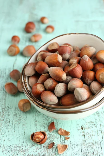 Hazelnuts in bowl — Stock Photo, Image