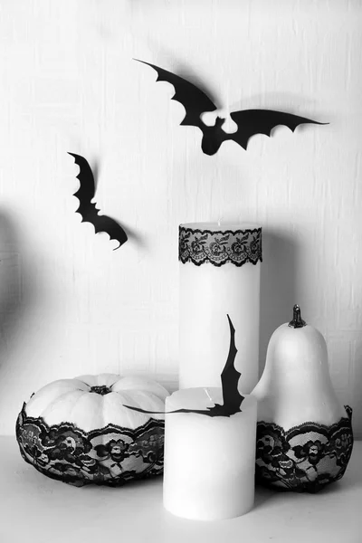 Candles and paper bats — Stock Photo, Image