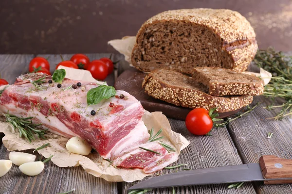 Raw bacon with bread — Stock Photo, Image