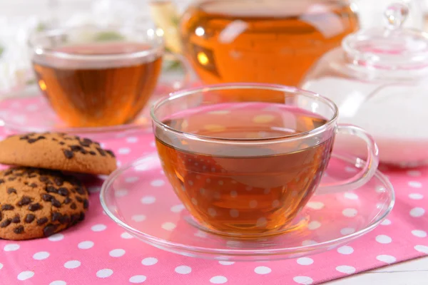 Teapot and cup of tea on table — Stock Photo, Image