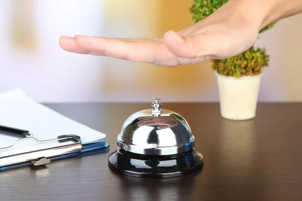 Female hand rings bell — Stock Photo, Image