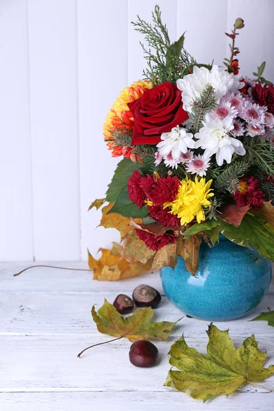 Flower bouquet in blue vase — Stock Photo, Image