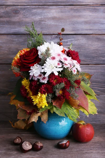 Flower bouquet in blue vase — Stock Photo, Image