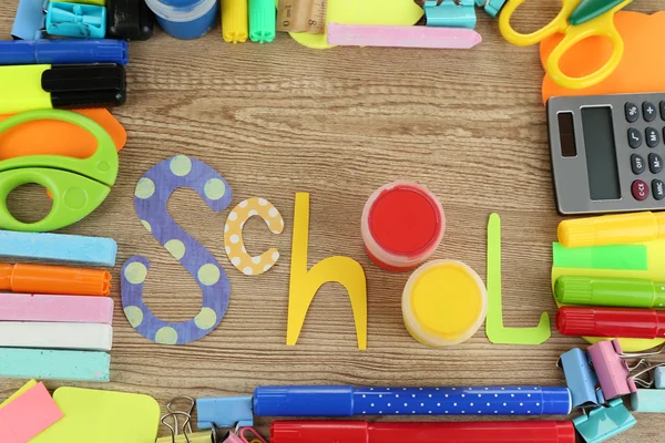 Inscription school lined of school supplies — Stock Photo, Image