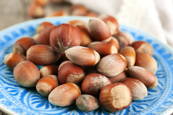 Hazelnuts on plate — Stock Photo, Image
