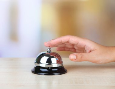 hand ring bell on  hotel reception desk