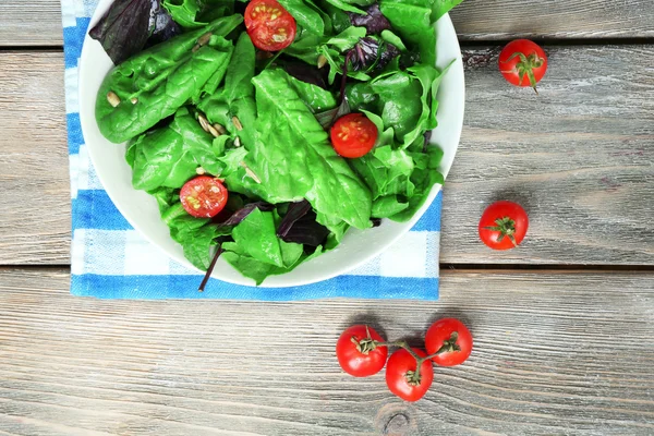 Fresh green salad in bowl — Stock Photo, Image