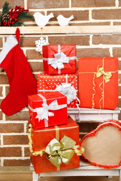 Christmas presents on stand ladder — Stock Photo, Image