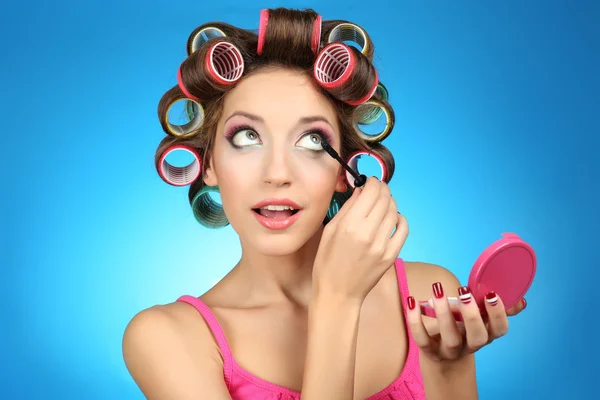 Girl in hair curlers — Stock Photo, Image