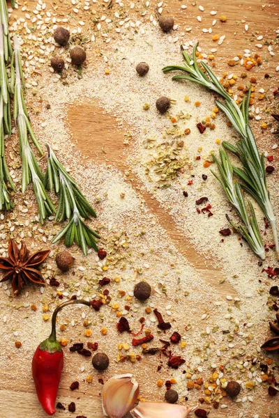 Especiarias na mesa com silhueta de colher — Fotografia de Stock