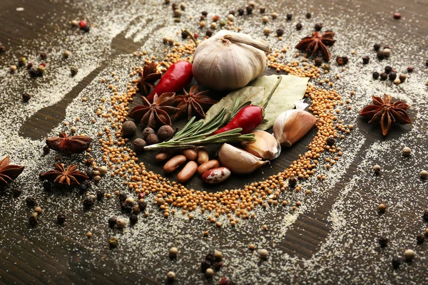 Spices on table with cutlery silhouette, close-up — Stock Photo, Image