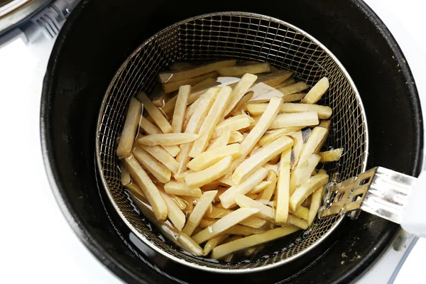 Schnitzels in friteuse — Stockfoto